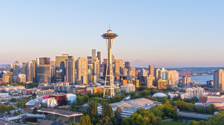 An aerial shot of Seattle's famous skyline with Mount Rainier in the distance