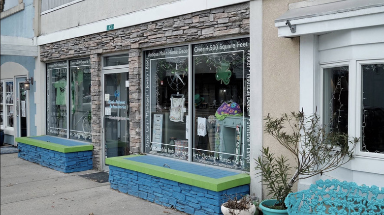 Blue stone seats outside a store selling antiques and homeware in Kilmarnock, Lancaster County