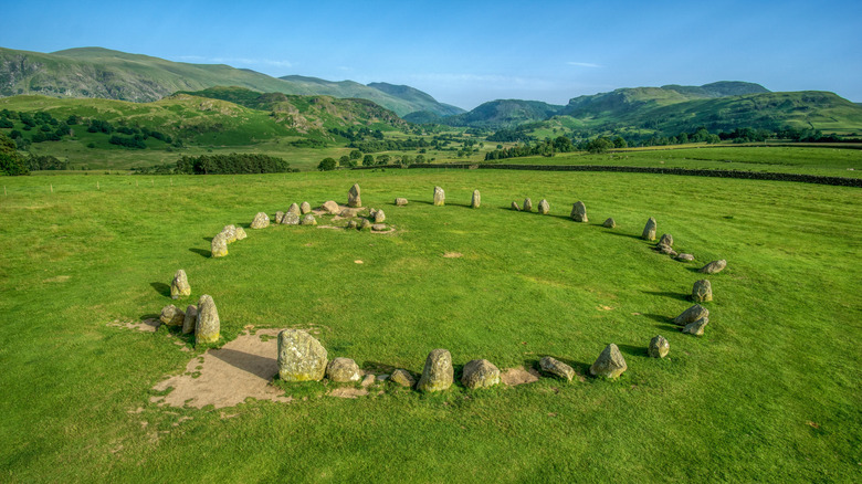 Elevated view of Castlerigg Stone Circle with mountains in background