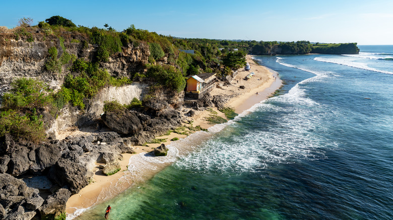 A drone view of Suluban beach Uluwatu, Bali, Indonesia, one of the most famous surf spots in the world