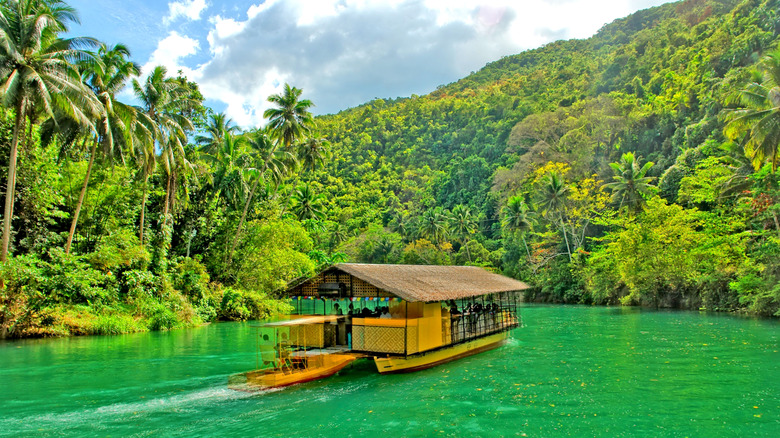 Aerial view of a lunch cruise boat on the Loboc River in Bohol, Philippines