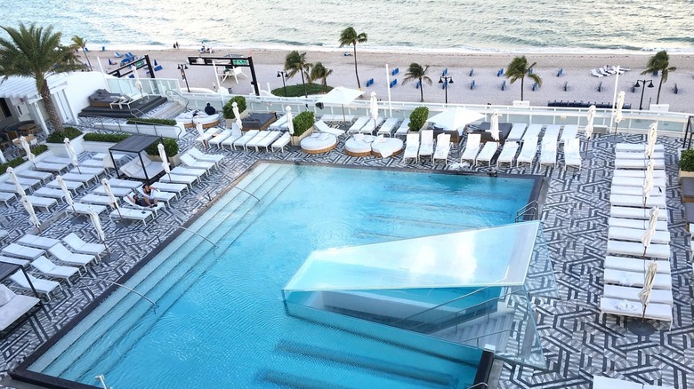 A balcony view of the pool and beach at the W Fort Lauderdale