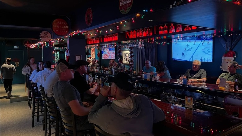 Customers at The Social Club and Lounge in Lighthouse Point, Florida