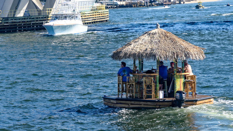 The floating tiki hut bar sailing across the water in Fort Lauderdale