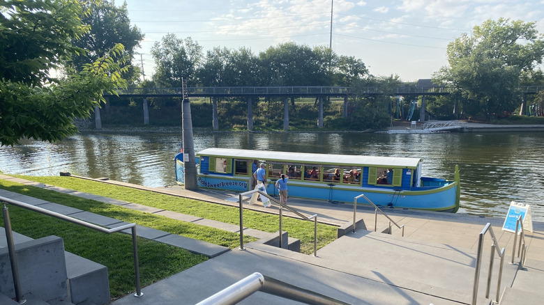 Sweet Breeze riverboat docked at Promenade Park's north bank