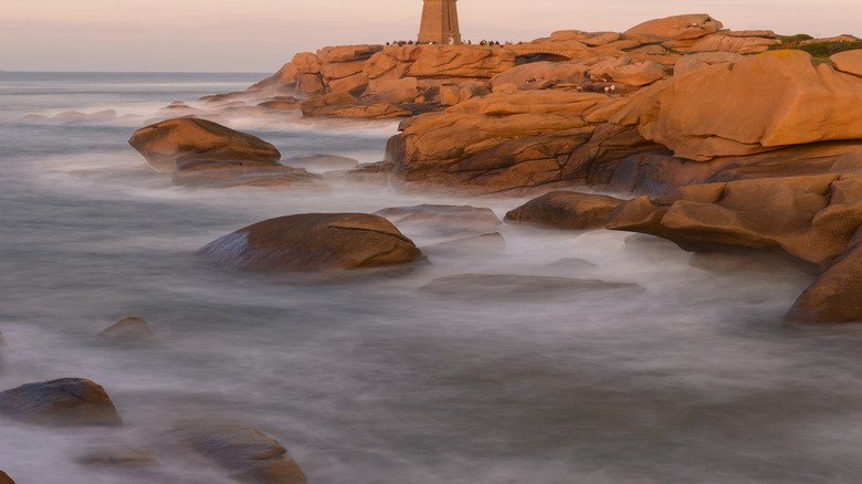 Phare de Men Ruz, the active lighthouse of Perros-Guirec in France, made of pink granite