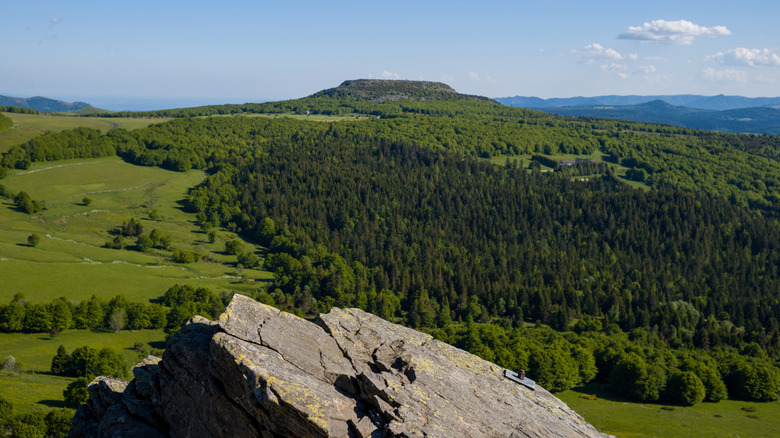 Flat-topped Mont de Gerbier de Jonc and green forests in France