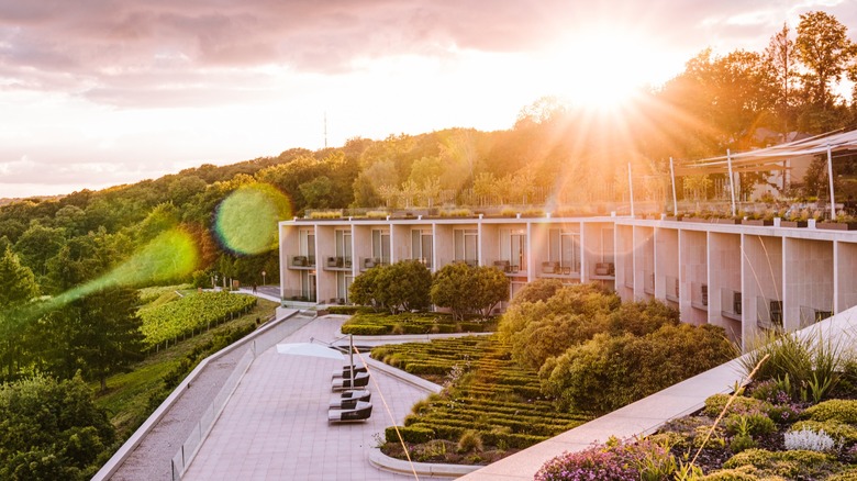 Exterior of the Royal Champagne Hotel & Spa in France at sunset