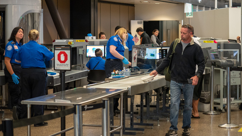 A man going through security at TSA