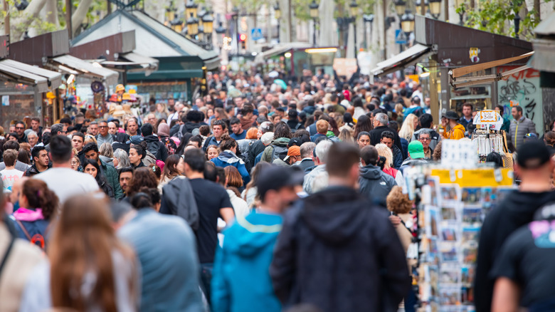 Tourists crowding streets in Barcelona