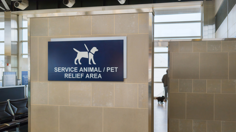 Sign outside an airport pet relief area