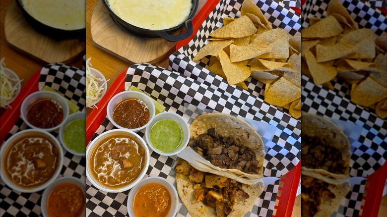 Tacos with various salsas and chips and queso from the Sonoran Grill.