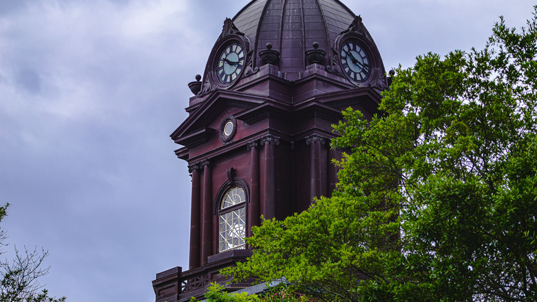 The clock tower of Newnan's historic county courthouse