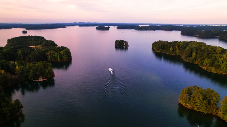 A boat on Lake Lanier at sunset