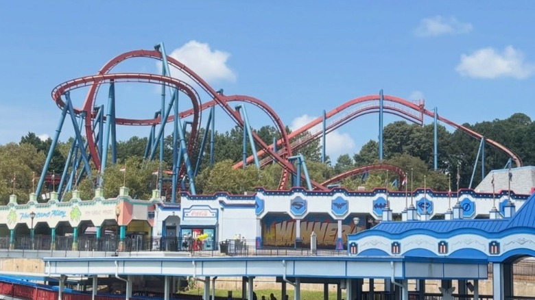 A roller coaster towers over the park at Six Flags Over Georgia