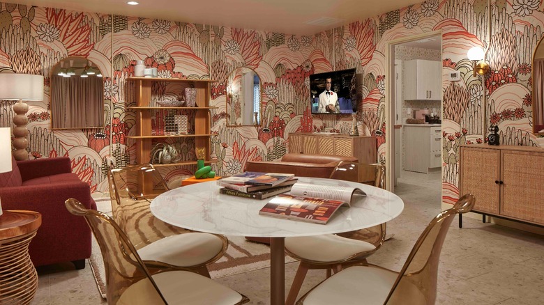 Living and dining room in the Owner's Suite with retro interiors and quirky furniture