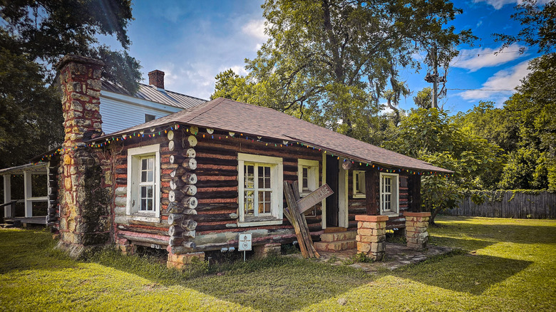 historic log house at the Frontier Village site in Fort Gaines, Georgia