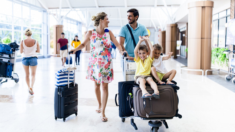 A family walking in the airport