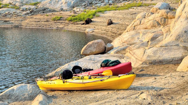 Kayaks on the shore of Florence Lake.