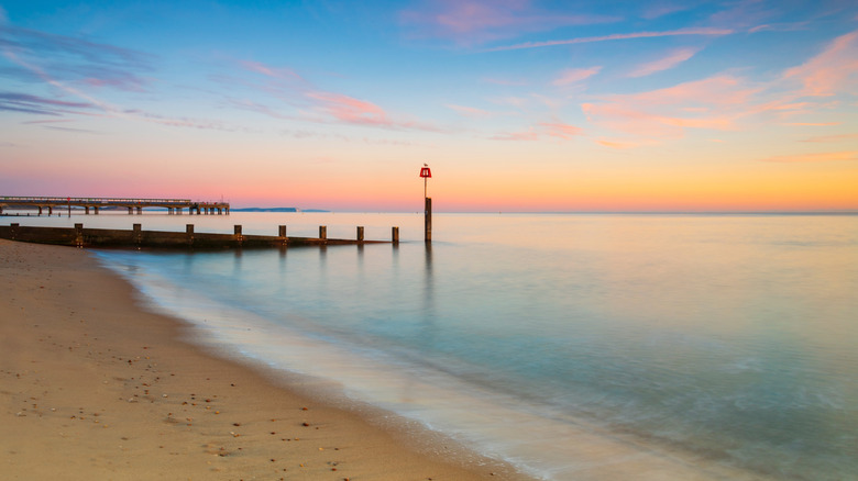 Pristine Bournemouth beach at sunset