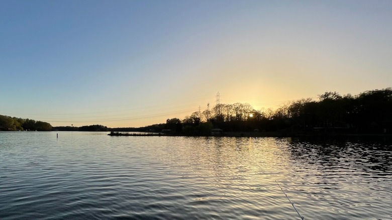 Sunset over the calm waters of Mountain Island Lake, North Carolina