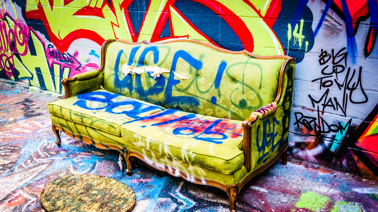 Painted walls and couch at Graffiti Alley in Baltimore