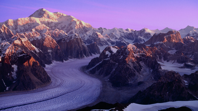 Purple sunset over the Great Gorge of Ruth Glacier in Alaska