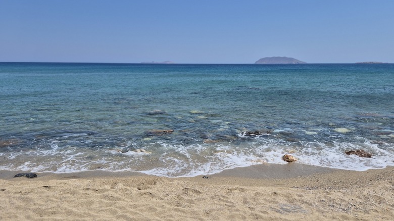 Clear waters and shoreline at Roukounas Beach on Anafi Island in Greece