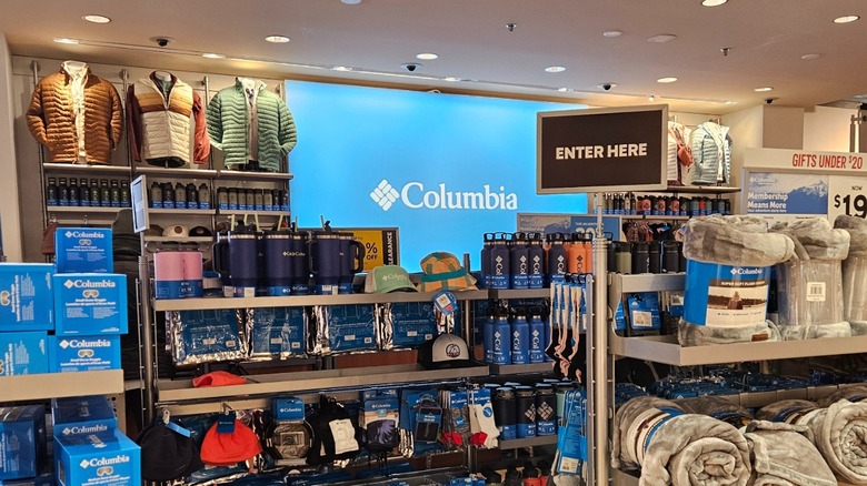 The checkout aisle lined with outdoor gear and apparel at Grove City Premium Outlet's Columbia factory store.