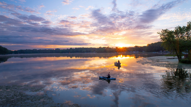 Kayakers on Nyona Lake in Fulton County, Indiana at sunrise