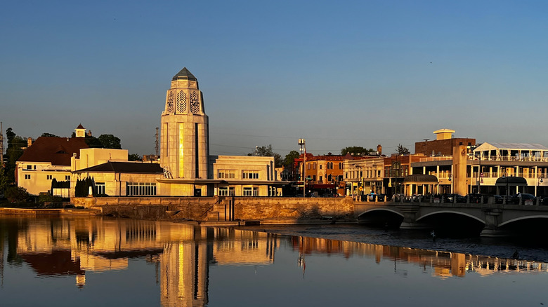Historic buildings of St. Charles reflected in the river in Illinois