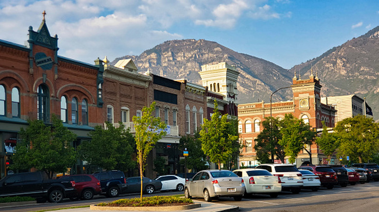 A street in downtown Provo with the Wasatch Mountains in the background