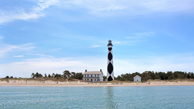 Cape Lookout Lighthouse from the water on a sunny day