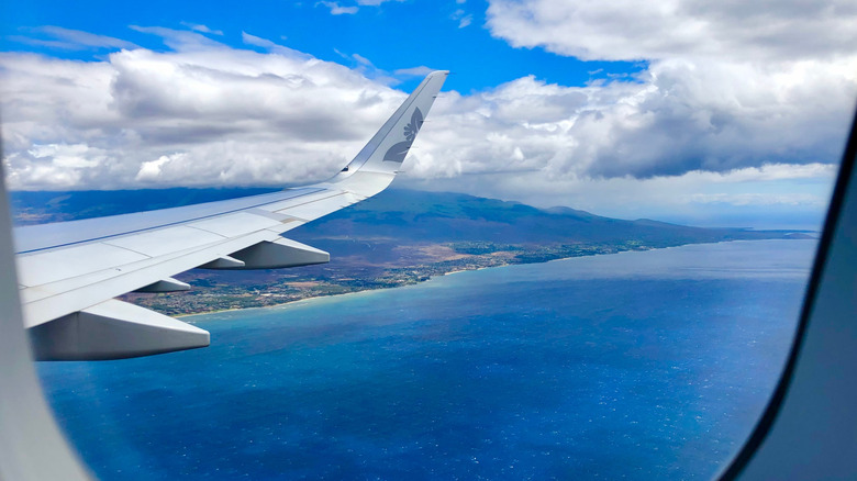 The view from a plane window landing in Kahului Airport, on Maui, Hawaii