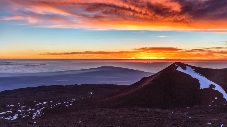 Striking sunset over Mauna Kea Volcano in Hawaii