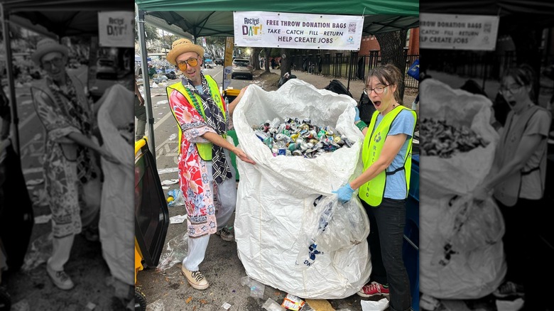 Recycle Dat! volunteers holding a large bag of recycled cans
