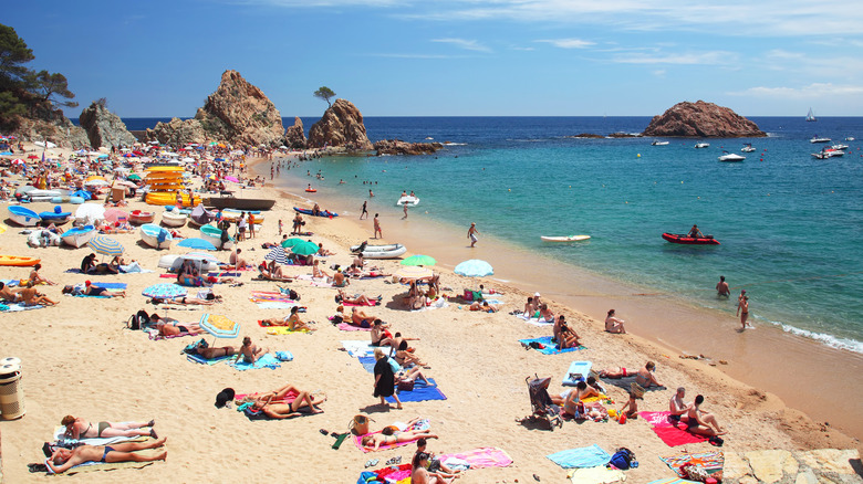 A crowded beach in Tossa de Mar