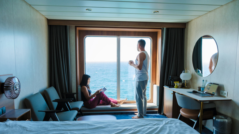 A couple in their cruise ship cabin in the Faroe Islands.