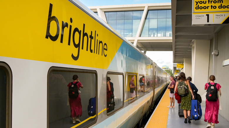 Passengers waiting to board a fast express train operated by Brightline between Miami and Orlando.