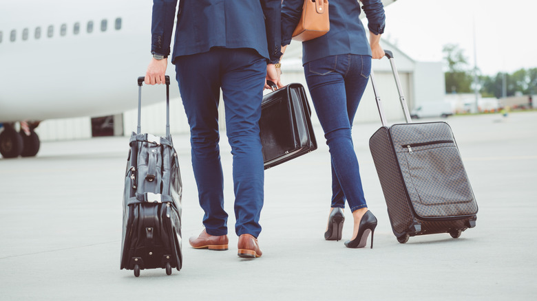 Travelers with flat and heeled shoes