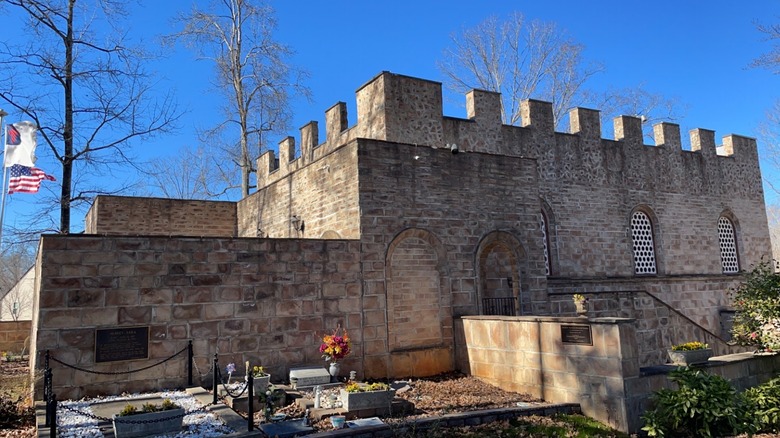 Upper Room Chapel stone exterior with castle architecture against blue sky Heritage USA South Carolina
