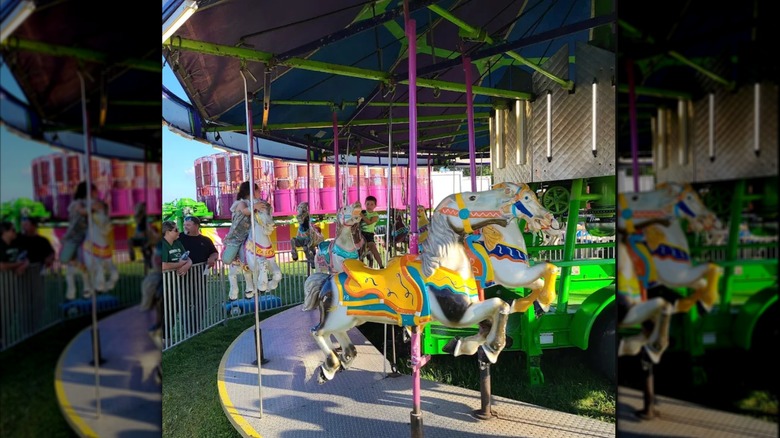 Children ride on a carousel at the Defiance County Fairgrounds