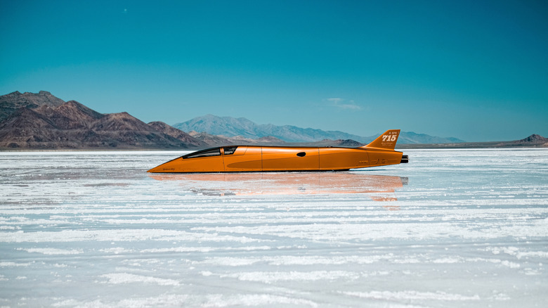 Speed Week vehicle riding through Bonneville Salt Flats