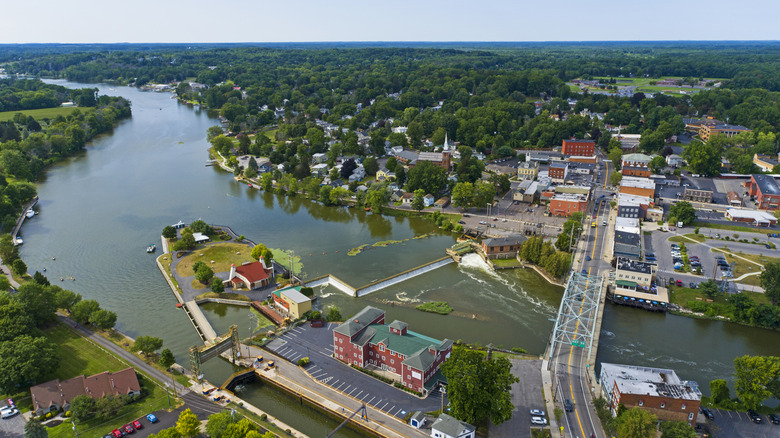 Locks and bridge surrounded by green trees in Baldwinsville, New York