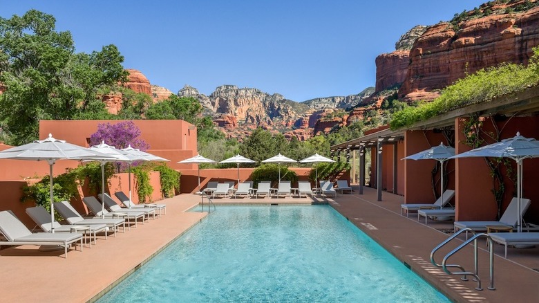 Mii Amo pool with Boynton Canyon desert rocks in Sedona, Arizona
