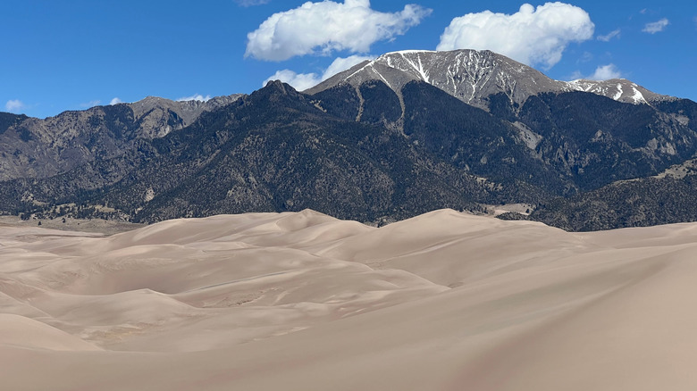 Great Sand Dunes in Colorado with mountains in the background