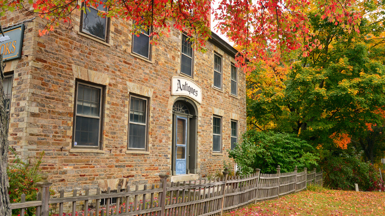 A historic stone house surrounded by fall foliage in Chesterfield, New Hampshire