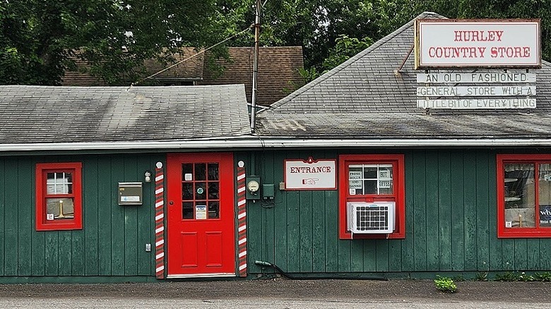 The front entrance to Hurley Country Store painted green and red in Christmas colors.