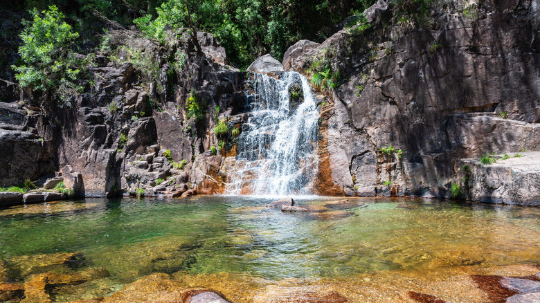 Waterfall called Cascata do Tahiti or also known as Fecha de Barcas in Northern Portugal located near Ermida in the region Braga, Peneda Geres National Park