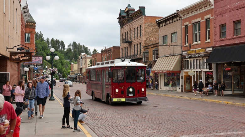 Pedestrians enjoy a day in historic downtown Lead, SD